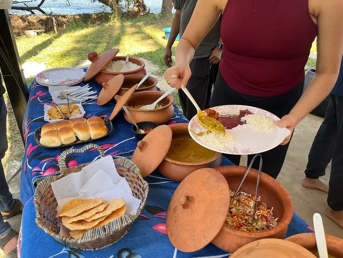 Island breakfast served in clay pots under the trees