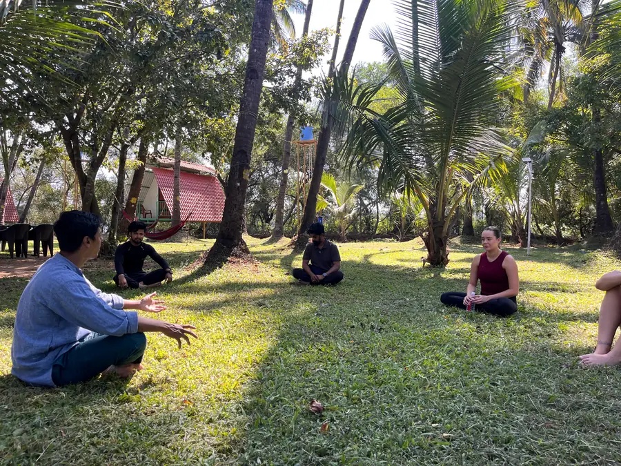 Sharing circle in the coconut palm grove