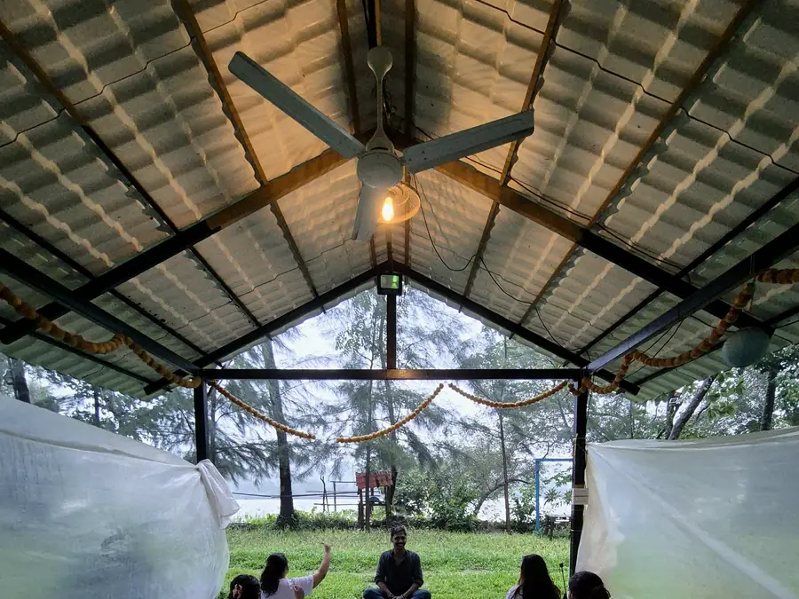 Evening group session under the open-air shala roof